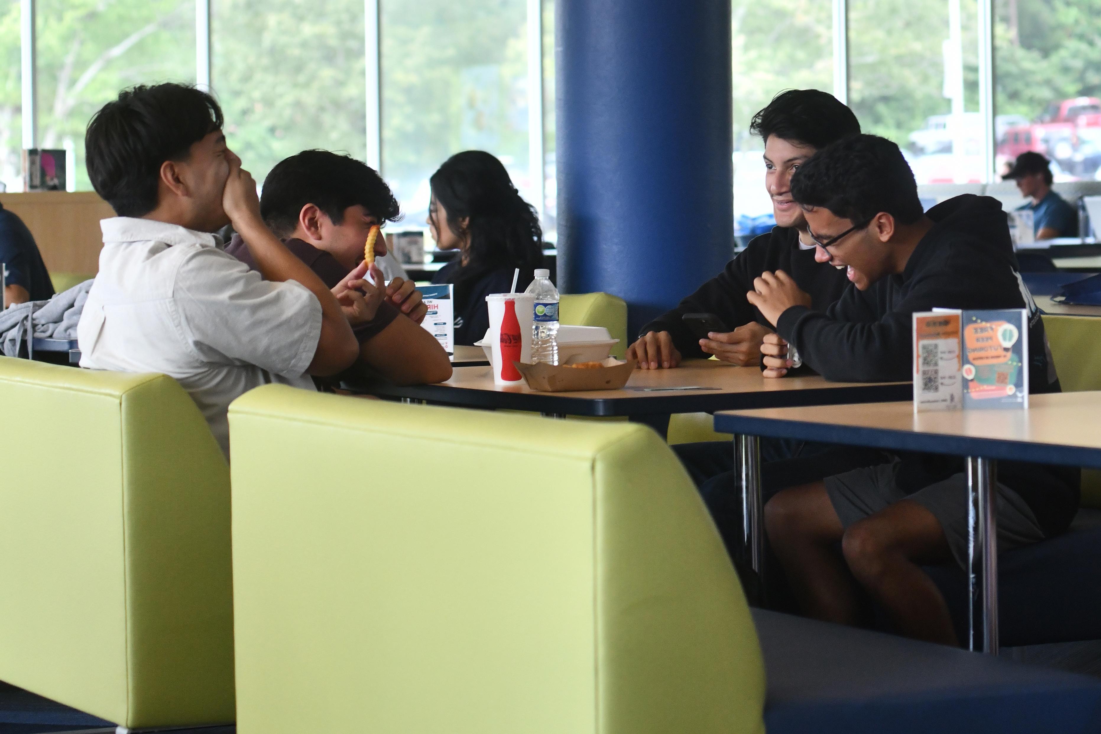 Students in upper pope eating lunch